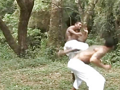 Two Beefy Karate Students Fuck In Forest