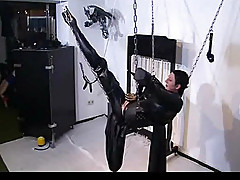 Horny master dildos his slave's pussy